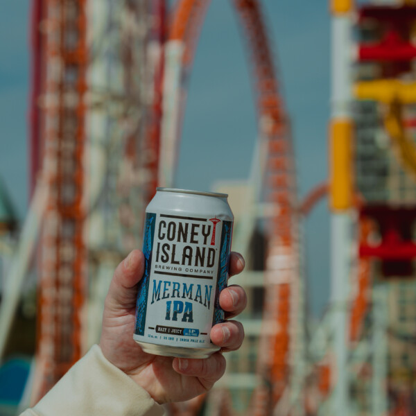 Can of Merman IPA in front of park ride